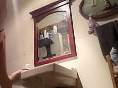 Abby on bathroom
