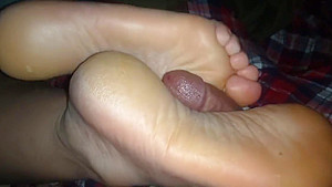 Ally gives uncomfortable footjob