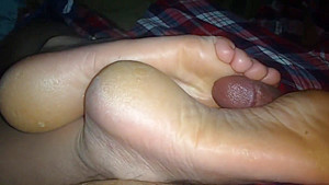 Ally gives uncomfortable footjob