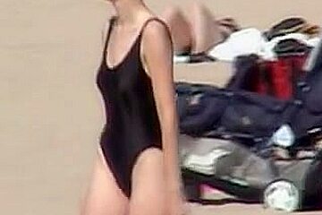 Amateur in black swimsuit on the candid beach video 07z