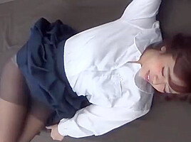 Asian girl squirms and wets herself after holding too long