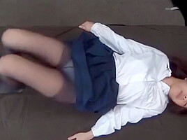 Asian girl squirms and wets herself after holding too long