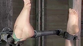 BDSM sub has mouth and nose clamped