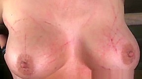 BDSM sub has mouth and nose clamped