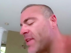 Bear gets facial after sitting on cock