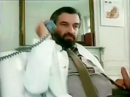 Bearded doctor being sucked by nurse