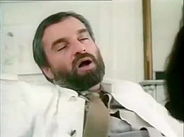 Bearded doctor being sucked by nurse