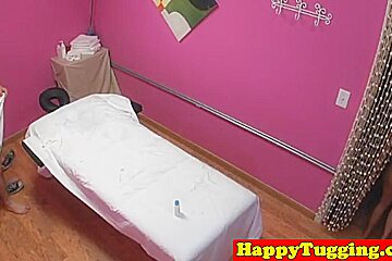 Bigtitted asian masseuse jerking and sucking