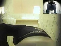 Blonde girl in tight jeans pants peeing