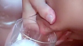 Blonde peeing milk from tits