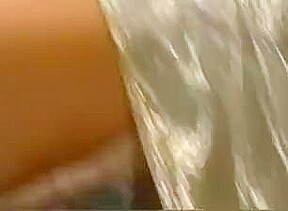 Blonde teases in satin panties and skirt