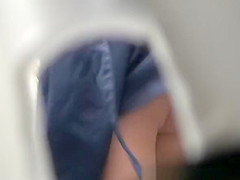 Blonde woman caught peeing