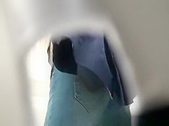 Blonde woman caught peeing