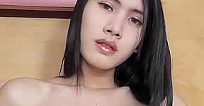 Busty Ladyboy in Fishnet Stockings Enjoys Masturbating Solo in Bed