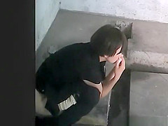 Chinese women caught peeing in holes