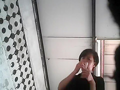 Chinese women caught peeing in holes
