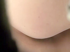 Close up shot of shaved pussy pissing