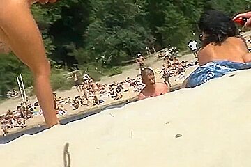 Completely nude white slut puts sunscreen on her self