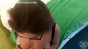Dani is wearing black glasses and erotic stockings while sucking and riding her friends hard dick
