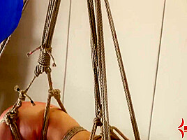Dominated and bound BDSM fetish babe