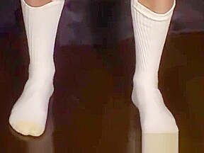 Feet loving jock stroking his long dick until he squirts cum