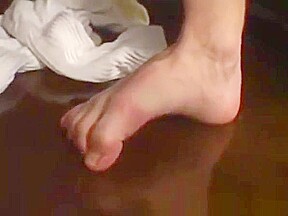 Feet loving jock stroking his long dick until he squirts cum