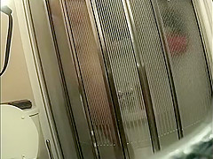 Fit milf spied under the shower