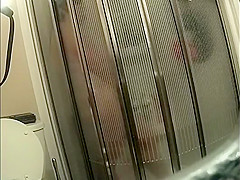 Fit milf spied under the shower