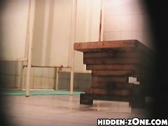 Girl hiding her nudity from kinky shower cameraman