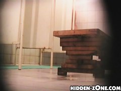 Girl hiding her nudity from kinky shower cameraman