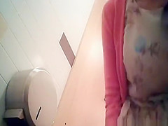 Girl in dress and ponytail pissing