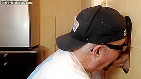 Gloryhole amateur DILF sucks rod with his hungry mouth