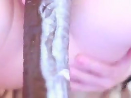 Guy sucking a monster black dildo then anal