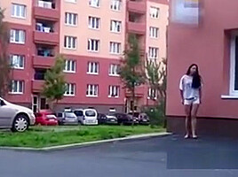Half Naked Brunette Pissing Behind A Building