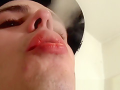 Homosexual thug smokes and plays with a penis pump solo