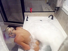 Horny girl spied in soapy bath