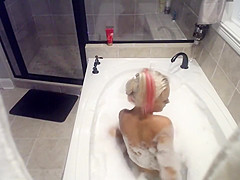Horny girl spied in soapy bath