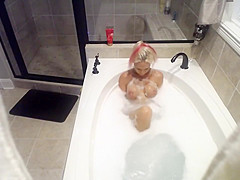 Horny girl spied in soapy bath