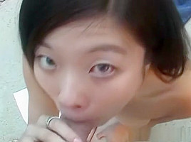 Hot Chinese babe giving a hot blowjob