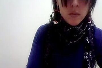 Hot Latina women with glasses enjoys stripping on cam