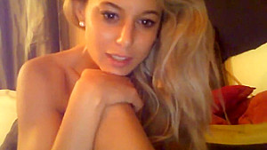 Hot babe masturbates with a dildo