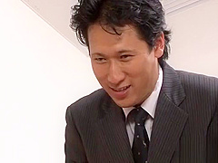 Japanese chick finger fucked in an office threesome