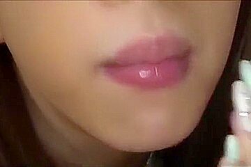 Japanese with long nails gives a great blowjob on bed