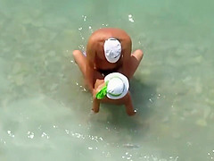 Kama Sutra on the beach Couples have sex in the sea