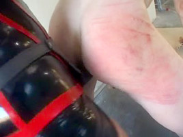 Latex bitch makes her BF worships a strapon cock