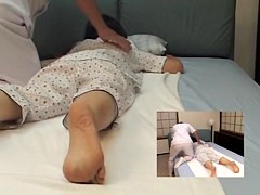 Lovely Asian relaxes in erotic massage video