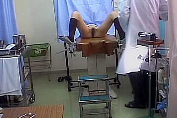 Lovely Japanese gets her pussy toyed during a Gyno exam