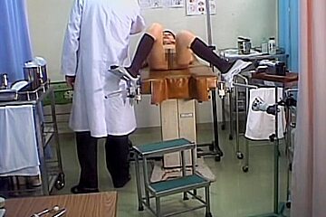 Lovely Japanese gets her pussy toyed during a Gyno exam