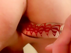 Lusty young twink shoves a toy up his ass and jerks off solo