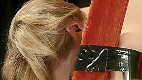 MILF slave is tied up to a sex swing and sucks his dick and gets hammered